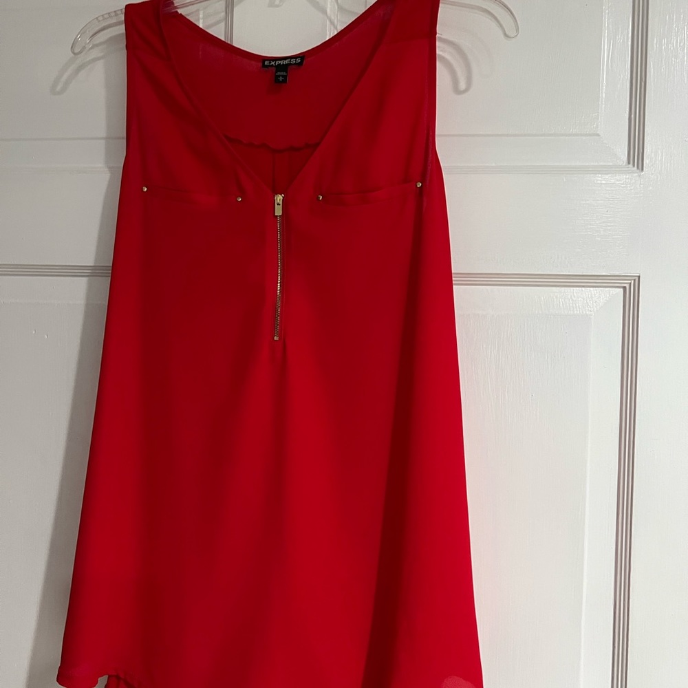 Express Red (not pink) top L /front is polyester/ back  a stretchy rayon cotton.